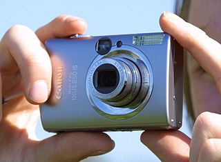 amateur photographer using a Canon Digital IXUS 850 IS jpg